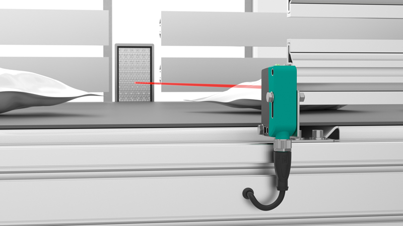 photoelectric sensor with a single-point light beam for object detection